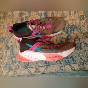 Nike 9.5 Women's Brown Running Shoes with Pink and Blue Accents